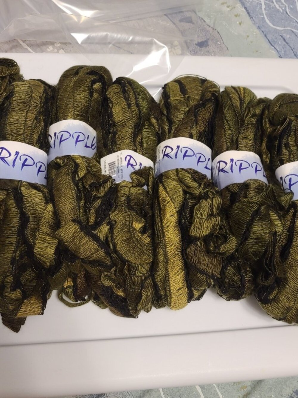7 Skeins Of Dark Green Ripple Yarn